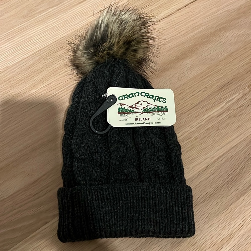 NWT cable-knit dark gray hat with pom